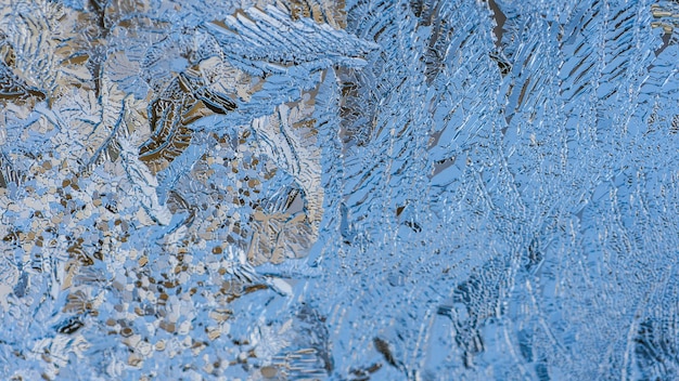 Close-up shot van prachtige vorst patronen en texturen op een glas