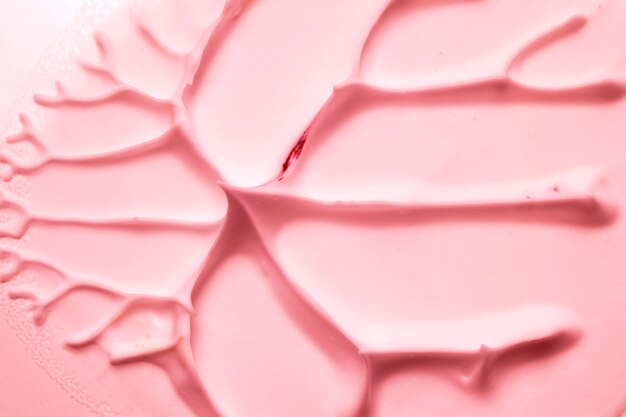 Close-up van een artistieke geweven perzikkleurachtergrond