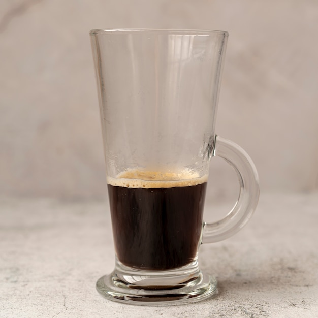 Gratis foto close-up van een koffieglas