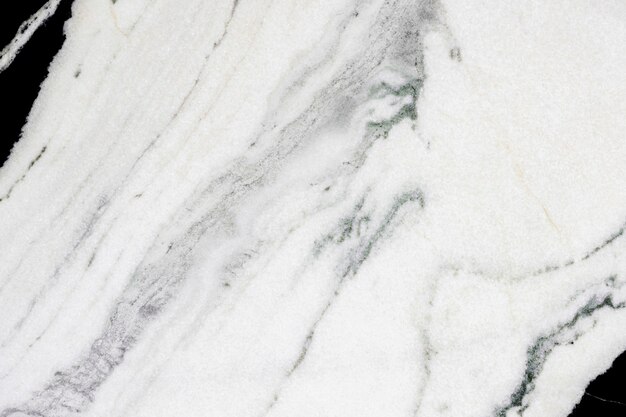 Close up van een witte marmeren getextureerde muur