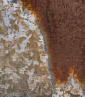 Gratis foto close-up van roestig metaaloppervlak