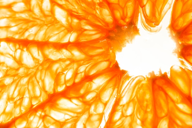 Gratis foto close-up van sinaasappelpulpplak