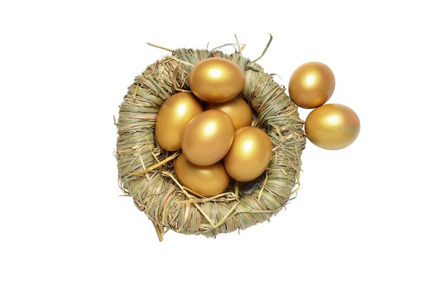 Concept van rijkdom en pensionering gouden eieren geïsoleerd op een witte achtergrond