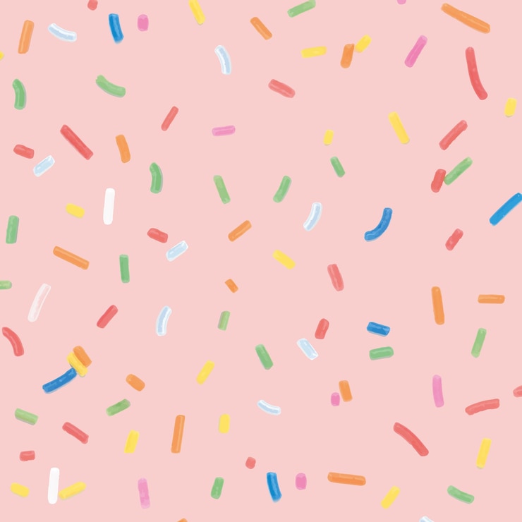 Gratis Foto confetti hagelslag achtergrond in roze