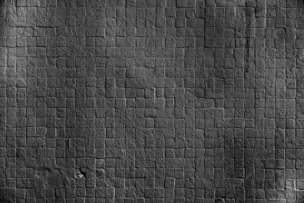 Dark vierkante bakstenen muur