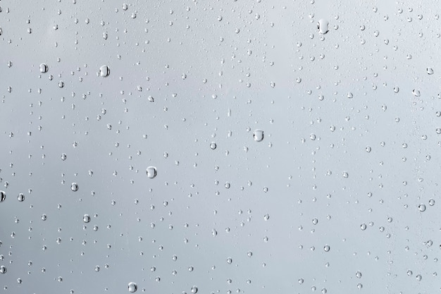 Gratis foto de achtergrond van de watertextuur, regenachtig venster op bewolkte dag