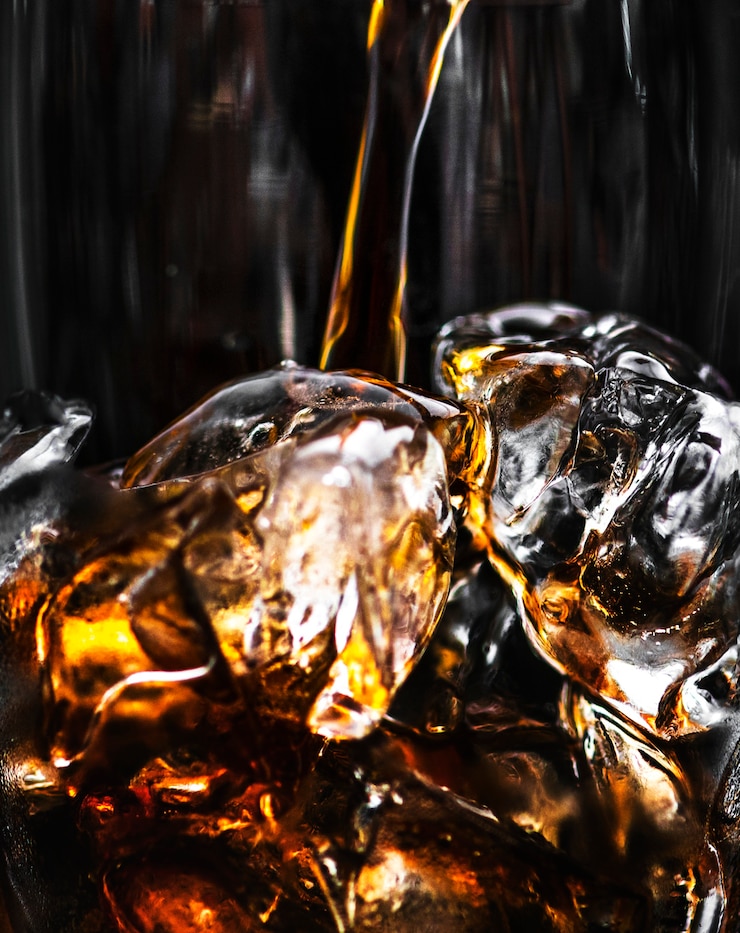 Gratis Foto de bruisende cola drinkt macroschot