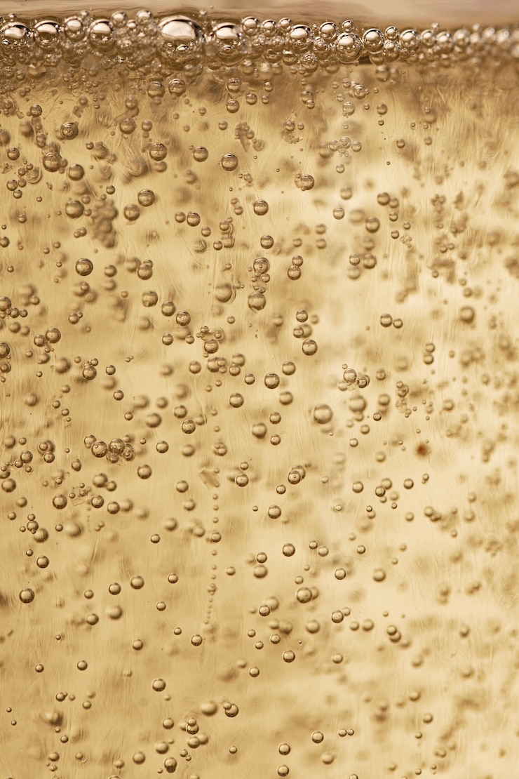 Gratis Foto de champagne van de close-upfonkeling borrelt