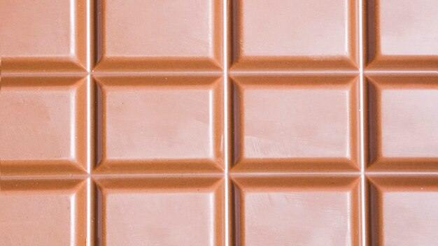De donkere chocoladereep van de close-up