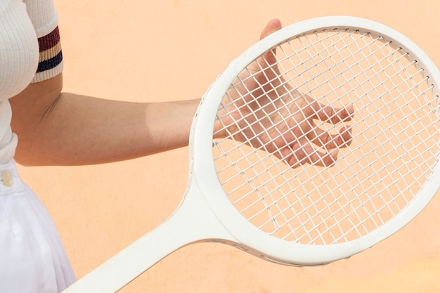 Gratis foto de tennisracket van de close-up op gebied