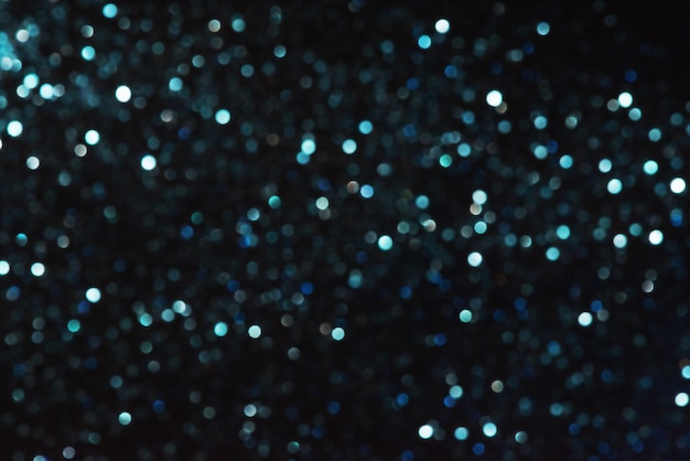 Defocus licht marineblauw glitter. abstracte lichte achtergrond