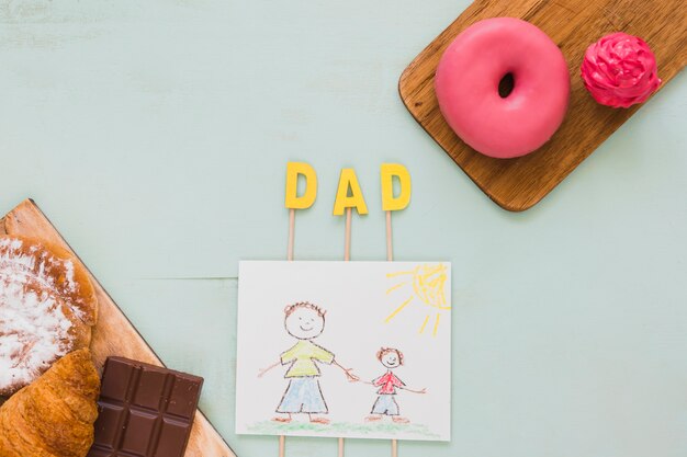 Desserts in de buurt van tekenen voor papa