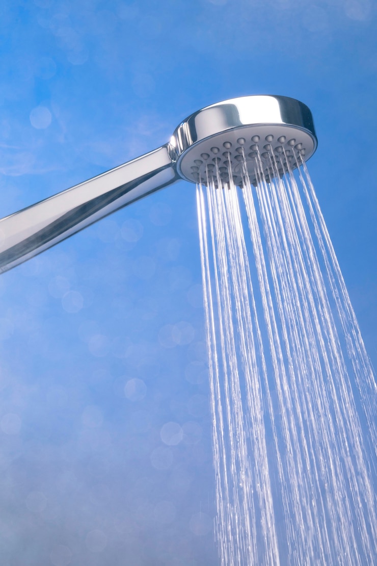 Gratis Foto douchekop met warm water