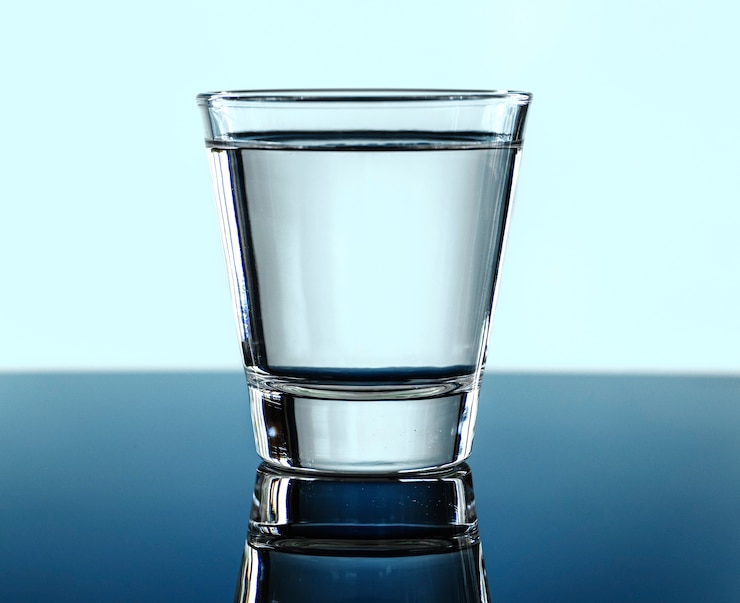 Gratis Foto een glas water macroschot