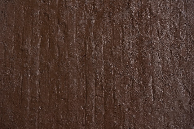 Eenvoudige bruine betonnen muurachtergrond