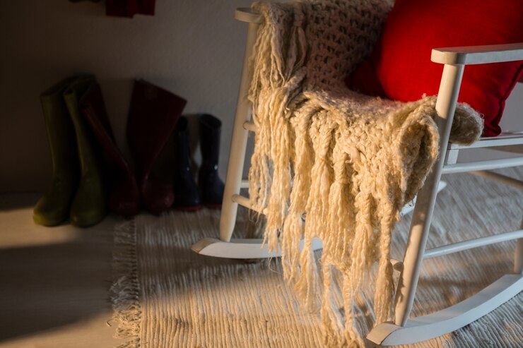 Gratis Foto fauteuil met een deken