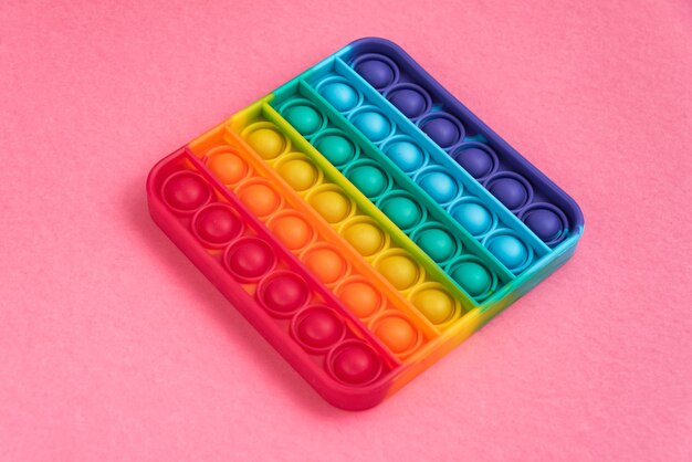 Fidget pop it speelgoed regenboogkleur - antistress, leuk en leerzaam