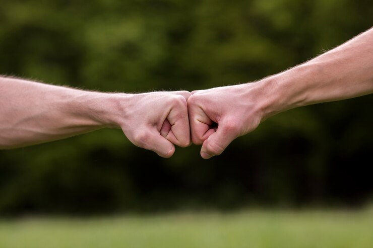 Gratis Foto fist bump welkom gebaar