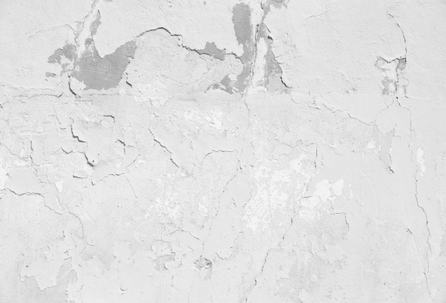 Gratis foto gebarsten vlokken bleke muur