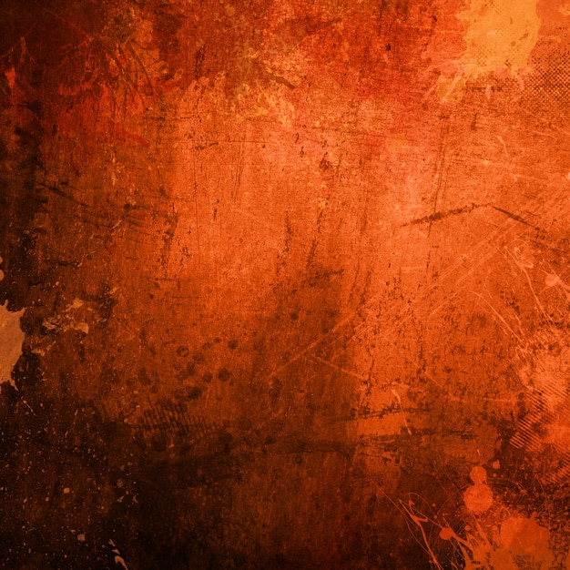 Gedetailleerde oranje grunge achtergrond met markeringen en vlekken
