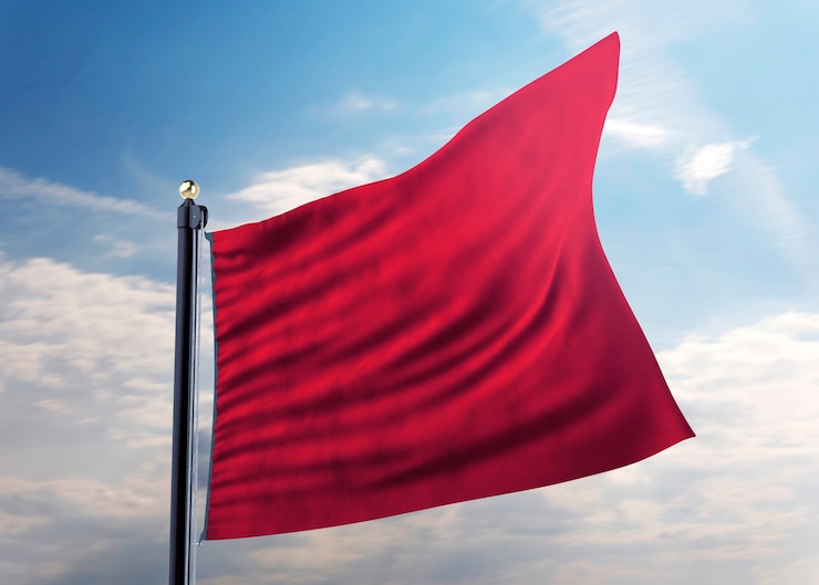 Gratis Foto geïsoleerde rode vlag in de natuur