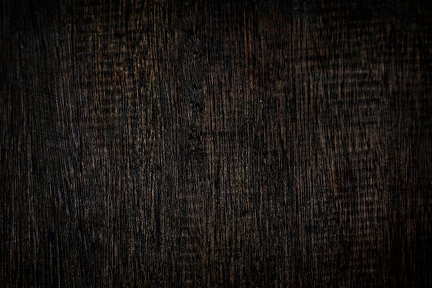 Gekraste donkerbruine houten gestructureerde achtergrond