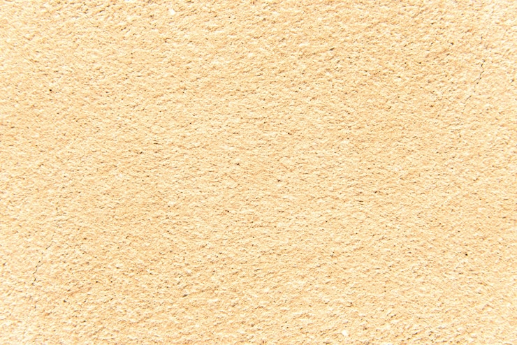 Gratis Foto gele getextureerde muur. achtergrond textuur.