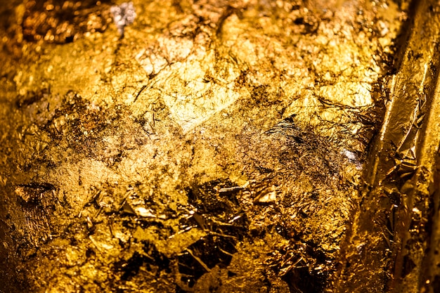 Gerimpelde gouden achtergrond met textuur