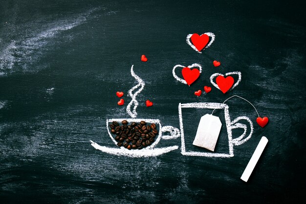 Geschilderde Kop van Koffie en thee op een oude school bord. Liefde of Vale