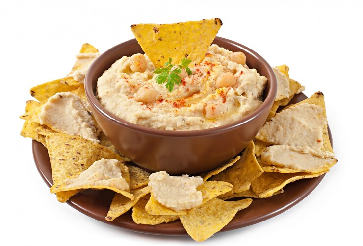 Gratis Foto gezonde zelfgemaakte hummus met olijfolie en pitabroodjes
