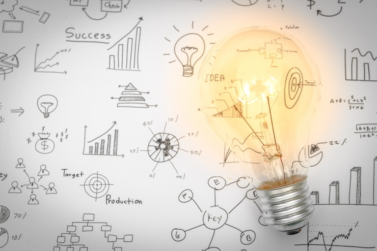 Gratis Foto gloeilamp met tekening grafiek
