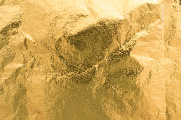 Gratis Foto gouden folie textuur achtergrond, glanzend inpakpapier decoratie-element