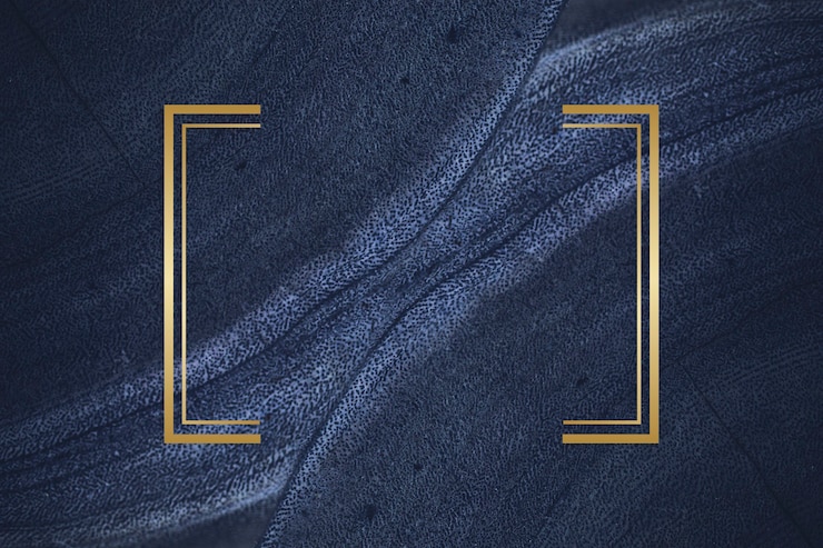 Gratis Foto gouden frame op een blauwe gestructureerde steen