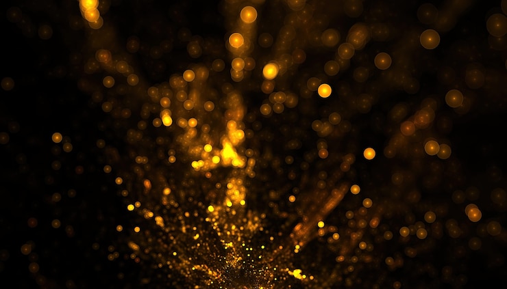 Gratis Foto gouden glitter deeltjes explosie bokeh achtergrond