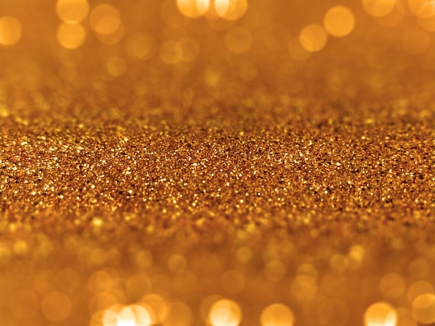 gouden glitter defocused bokeh achtergrond