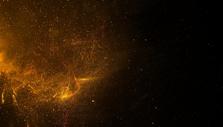 Gratis Foto gouden glitter poeder stof barsten achtergrond