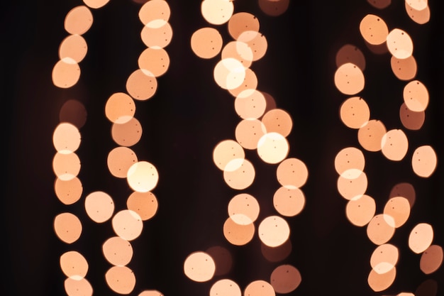 Gratis foto gouden lichten op feestje op nieuwjaarsnacht
