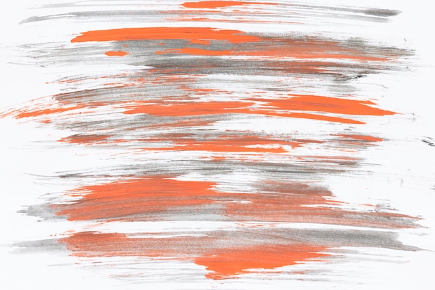 Gratis foto grijze en oranje penseelstreken