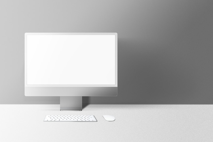 Gratis Foto grijze minimale computer desktop scherm digitaal apparaat met ontwerpruimte
