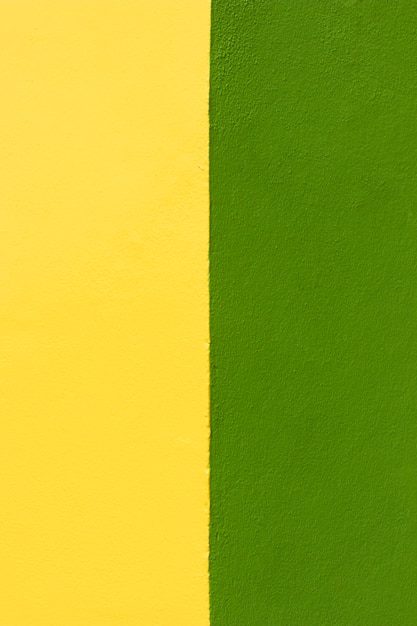Groene en gele muurachtergrond