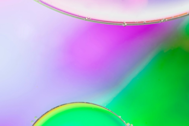 Groene en roze abstracte achtergrond met bubbels