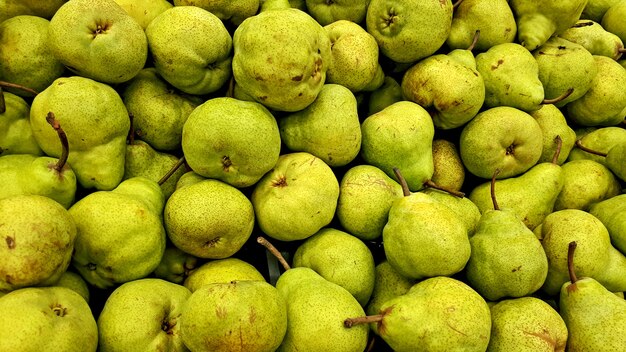 Groep groene peren close-up groene peren textuur veel groene peren in een groep