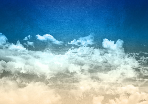 Grunge stijl blauwe hemel achtergrond met pluizige witte wolken