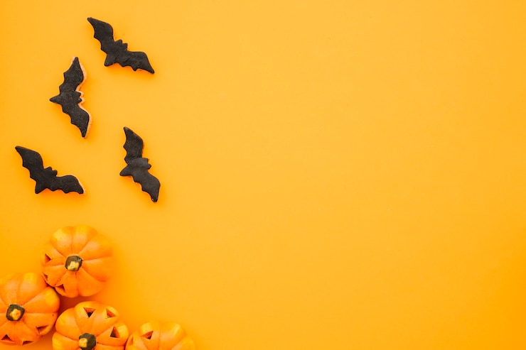 Gratis Foto halloween samenstelling met vleermuizen, pompoenen en ruimte