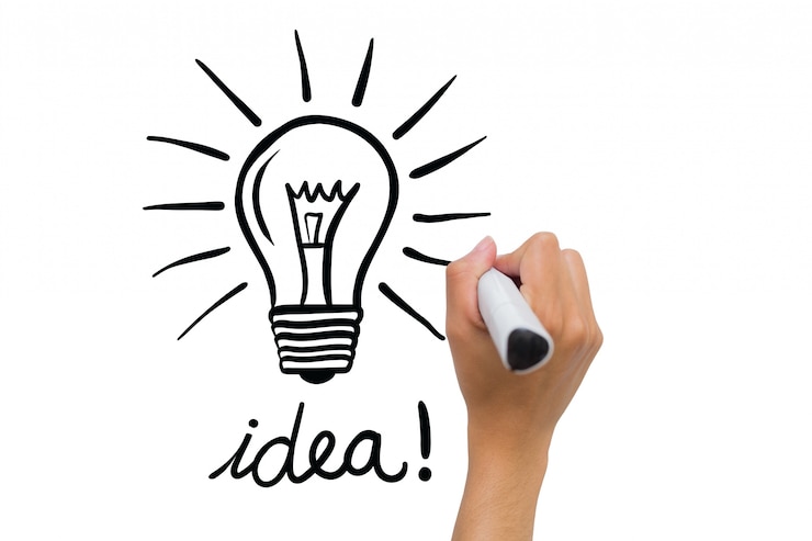 Gratis Foto hand die een gloeilamp en het woord tekenen "idee"