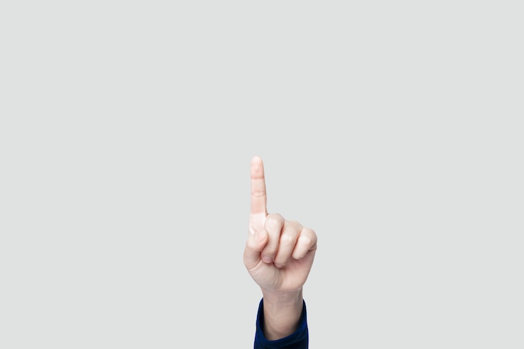 Gratis Foto hand die naar boven wijst