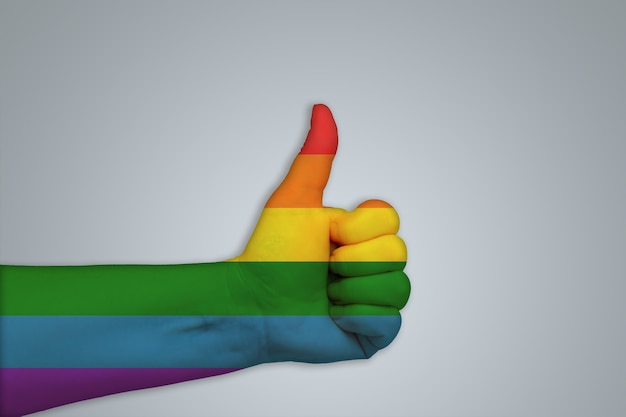 Hand getekend als een regenboogvlag op een grijze achtergrond. onderwerpen lgbt, lesbisch, homoseksueel, transgender, biseksueel. symbool van niet-traditionele minderheden.