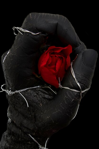 Hand grijpen van een roos