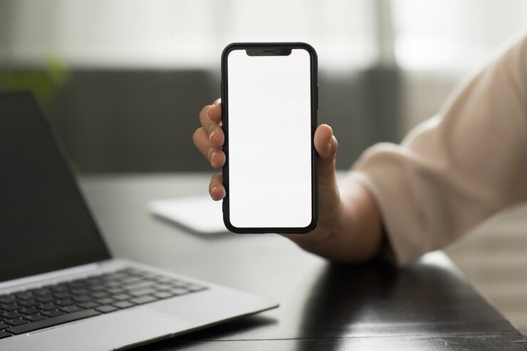 Gratis Foto hand met smartphone close-up