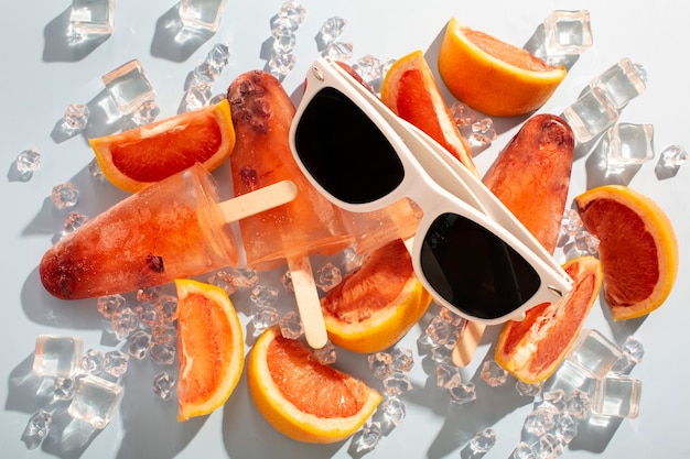 Gratis foto heerlijke oranje ijs pop stickles